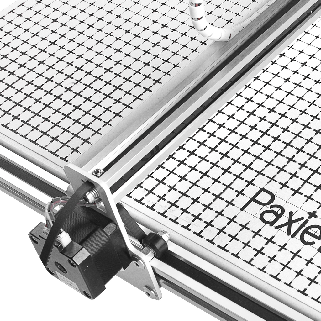 PaxieBot Plotter A3 machine Grid-patterned surface with 'Paxie' branding and mechanical components.