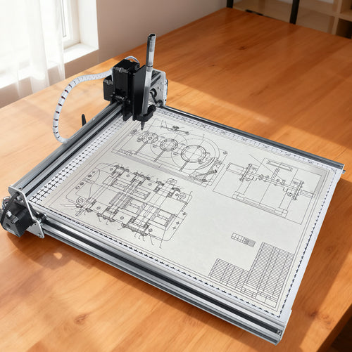 PaxieBot Plotter A3 machine. Drafting table with technical drawings on a wooden surface