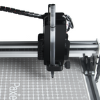 PaxieBot Smart Handwriting Machine on a grid surface with 'Paxie' branding