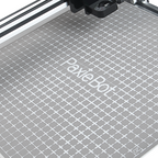 Gray grid surface with 'PaxieBot' branding on a white background