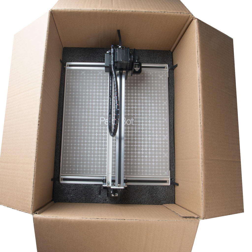 PaxieBot Smart Handwriting Machine in a cardboard box with 'PaxieBot' branding.